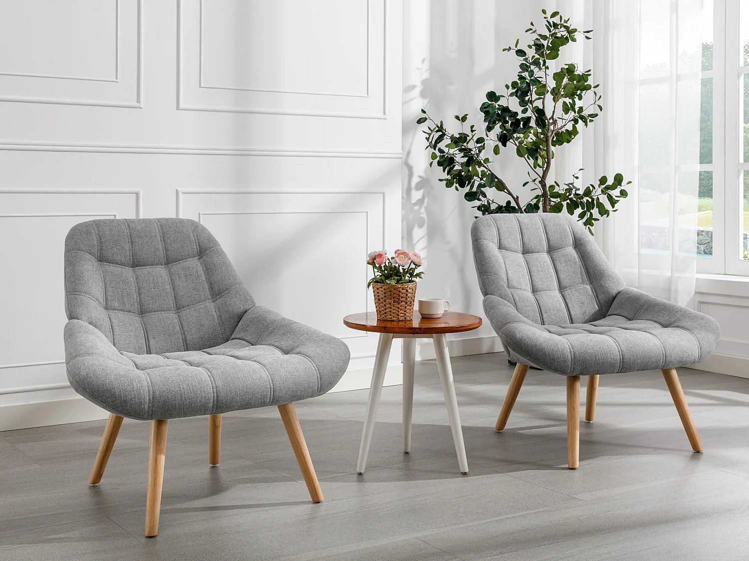 Fauteuil van grijze stof in Scandinavische stijl met capitonnage LUOSTO