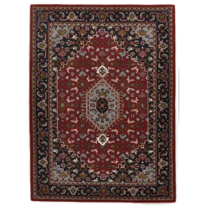 Handgetuft tapijt van wol 90×160 cm rood Royal Orient Handgetuft tapijt van wol 90×160 cm rood Royal Orient